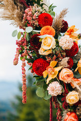 Elements of wedding arch in rustic style on mountains background