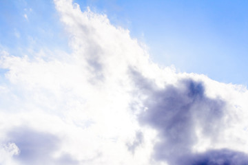 Beautiful puffy clouds isolated against blue skies