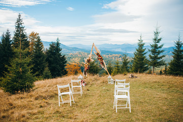 Wedding ceremony in stylish rustic style