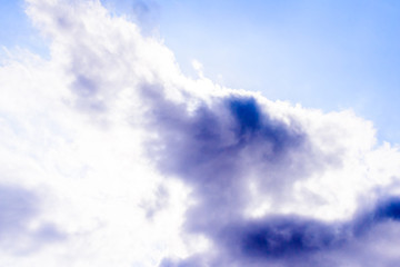 Beautiful puffy clouds isolated against blue skies