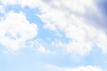 Beautiful puffy clouds isolated against blue skies