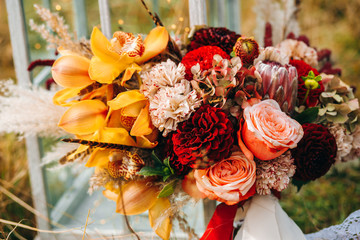 Amazing composition of autumn flowers in a bouquet
