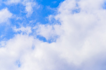 Beautiful puffy clouds isolated against blue skies