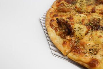 pizza with ham and cheese on plate