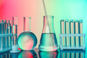 Laboratory chemistry glassware  on green toned background