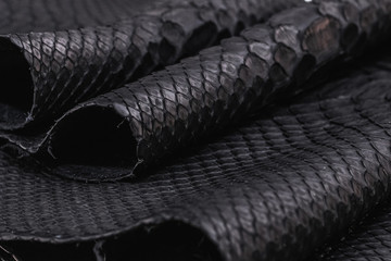 Real black snakeskin python leather.
