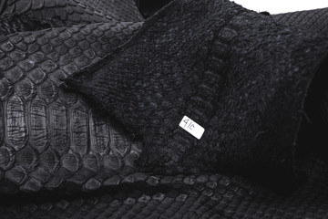 Real black snakeskin python leather.