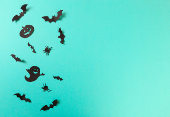 Halloween paper decorations on pastel blue  background. Halloween concept. Flat lay, top view, copy space - Image