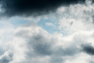 Beautiful puffy clouds isolated against blue skies