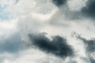 Beautiful puffy clouds isolated against blue skies