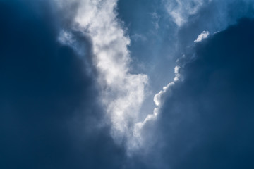 Beautiful puffy clouds isolated against blue skies