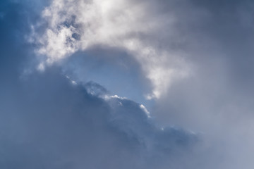 Beautiful puffy clouds isolated against blue skies