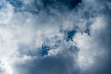 Beautiful puffy clouds isolated against blue skies
