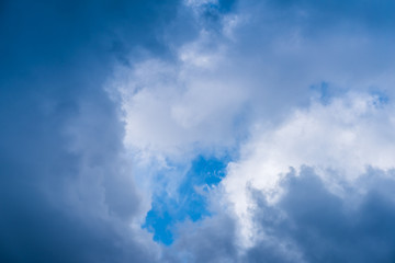 Beautiful puffy clouds isolated against blue skies