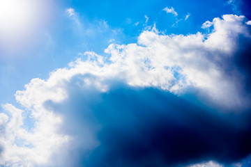 Beautiful puffy clouds isolated against blue skies