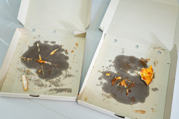 empty pizza box with pizza stains After Brunch time.