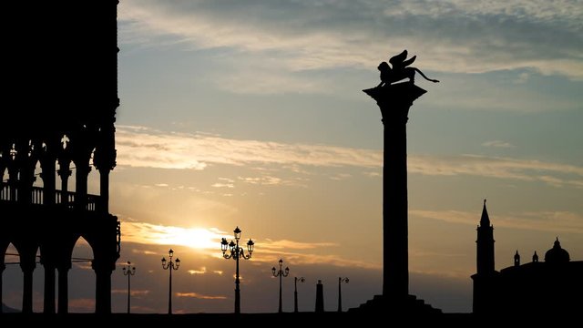 Venice: St Mark's Square or Piazza San Marco with Winged Lion and Doge's Palace, Time Lapse at Sunrise, Italy
