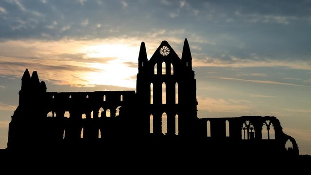 Whitby Abbey Castle, Time Lapse at Sunrise with Ruined Gothic Church which Inspired Bram Stoker to write his Famous Novel Dracula, England, UK