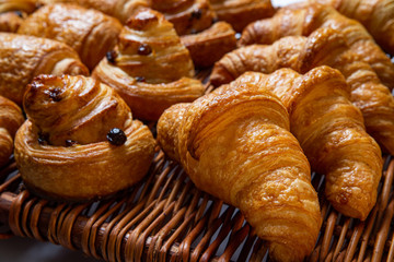 Freshly baked cinnamon buns. Sweet Homemade Pastry baking. Close-up