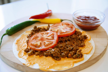 Delicious tortillas on kitchen table
