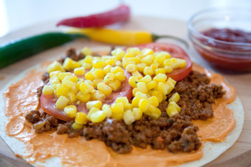 Delicious tortillas on kitchen table