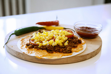 Delicious tortillas on kitchen table