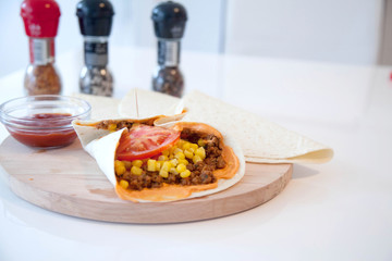 Delicious tortillas on kitchen table