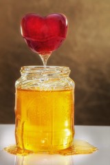 Honey with fruits in a glass jar 