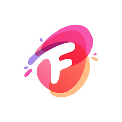 Letter F logo at colorful watercolor splash background.