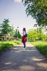 Beautiful Woman walking on street.