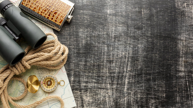 Top view binoculars on a wooden table