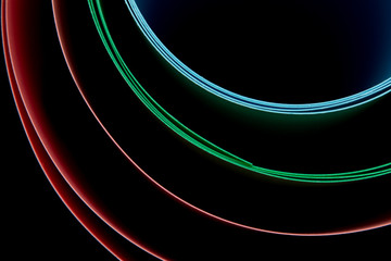 multi-colored lines on a black background
