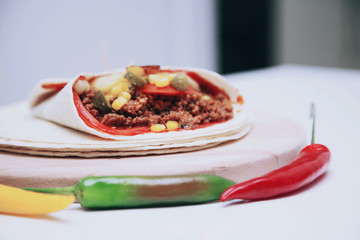 Delicious tortillas on kitchen table