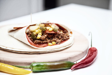 Delicious tortillas on kitchen table
