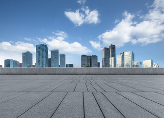 Empty city square road and modern business district office buildings in Beijing, China