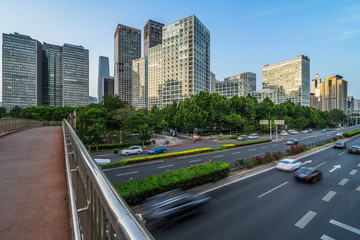 Obraz premium traffic on road and buildings in beijing.