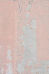 古いピンク色の壁