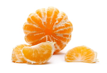 Peeled tangerine with slices isolated on white background