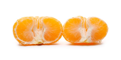 Peeled tangerine halves isolated on white background