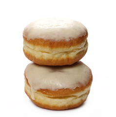 Doughnuts with vanilla cream icing isolated on white background
