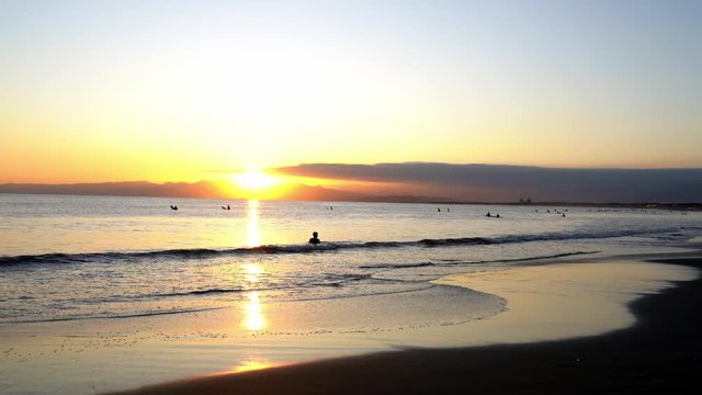 Surfers in the evening 