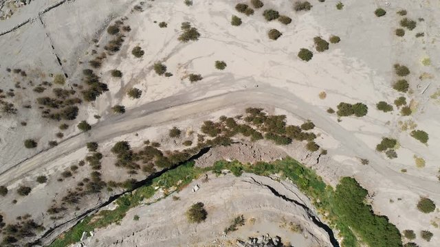 Arial footage of "Finca de Chañaral" an oasis used by the Incas on their Inca Trail for resting and get some water since is the unique oasis in the area at 1,500masl. A rugged canyon inside the Andes
