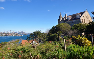 View on Sydney Harbor, Sydney Tower Eye and City with Kincoppal Rose Bay School building on a forefront. Vaucluse suburb, Sydney, Australia - obrazy, fototapety, plakaty