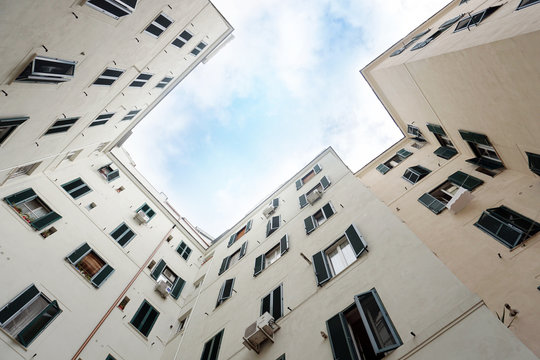 Old multi storey apartment house. View from the bottom up. Rome, Italy