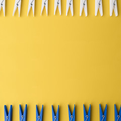 Top view clothespin with yellow background