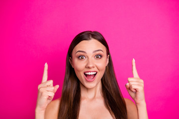 Closeup photo of funny lady indicating fingers up empty space showing unexpected low shopping prices naked shoulders isolated vivid pink color background