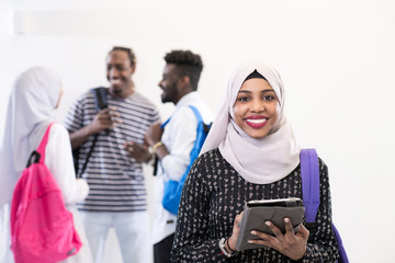 african female student with group of friends