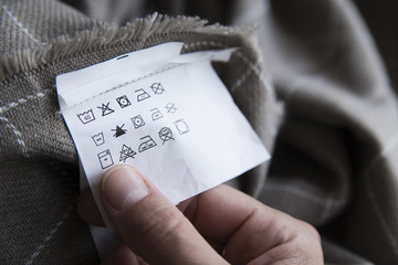 Clothing label with laundry care instructions
