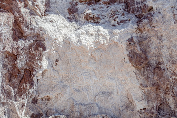 Salt crystals on the salty surface of desert close up. Natural background with copy space