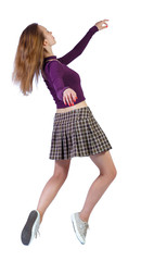 Side view of a woman dancing ballet.